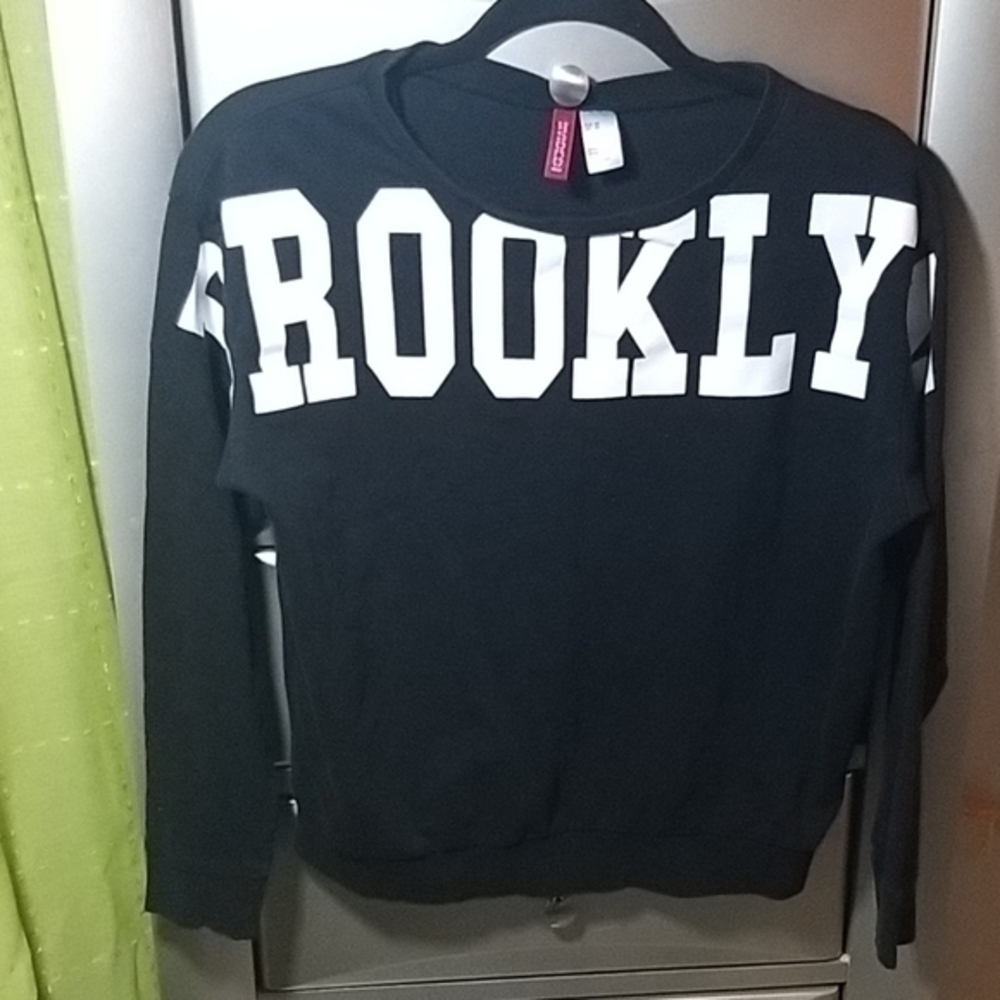 Divided Black Long slv tee Brooklyn sign